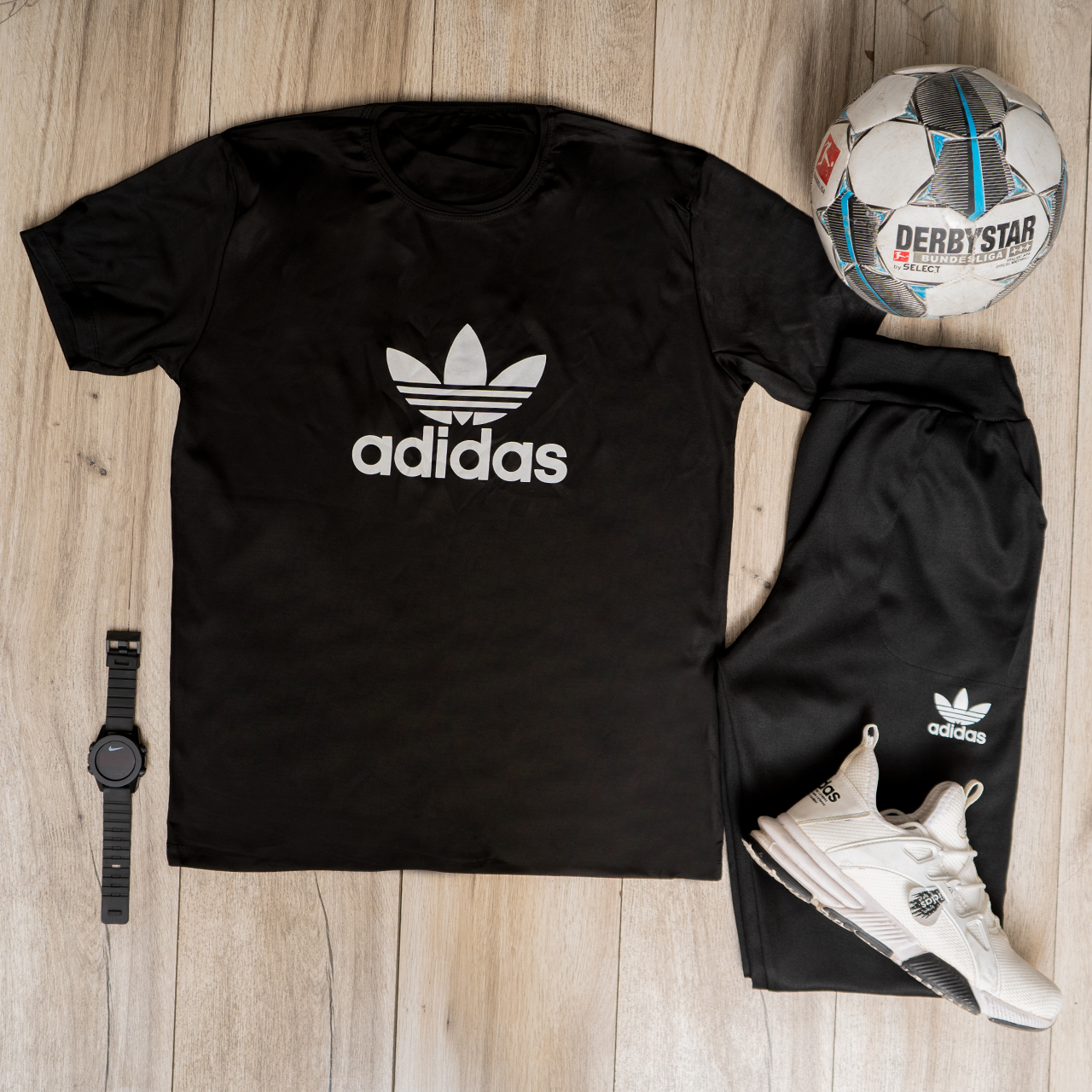 ست تیشرت شلوار آدیداس مشکی مردانه مدل Otava