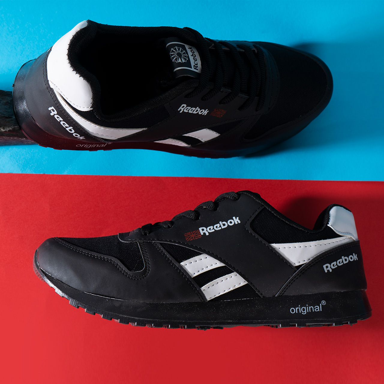 کفش ورزشی Reebok مشکی سفید مردانه مدلRako