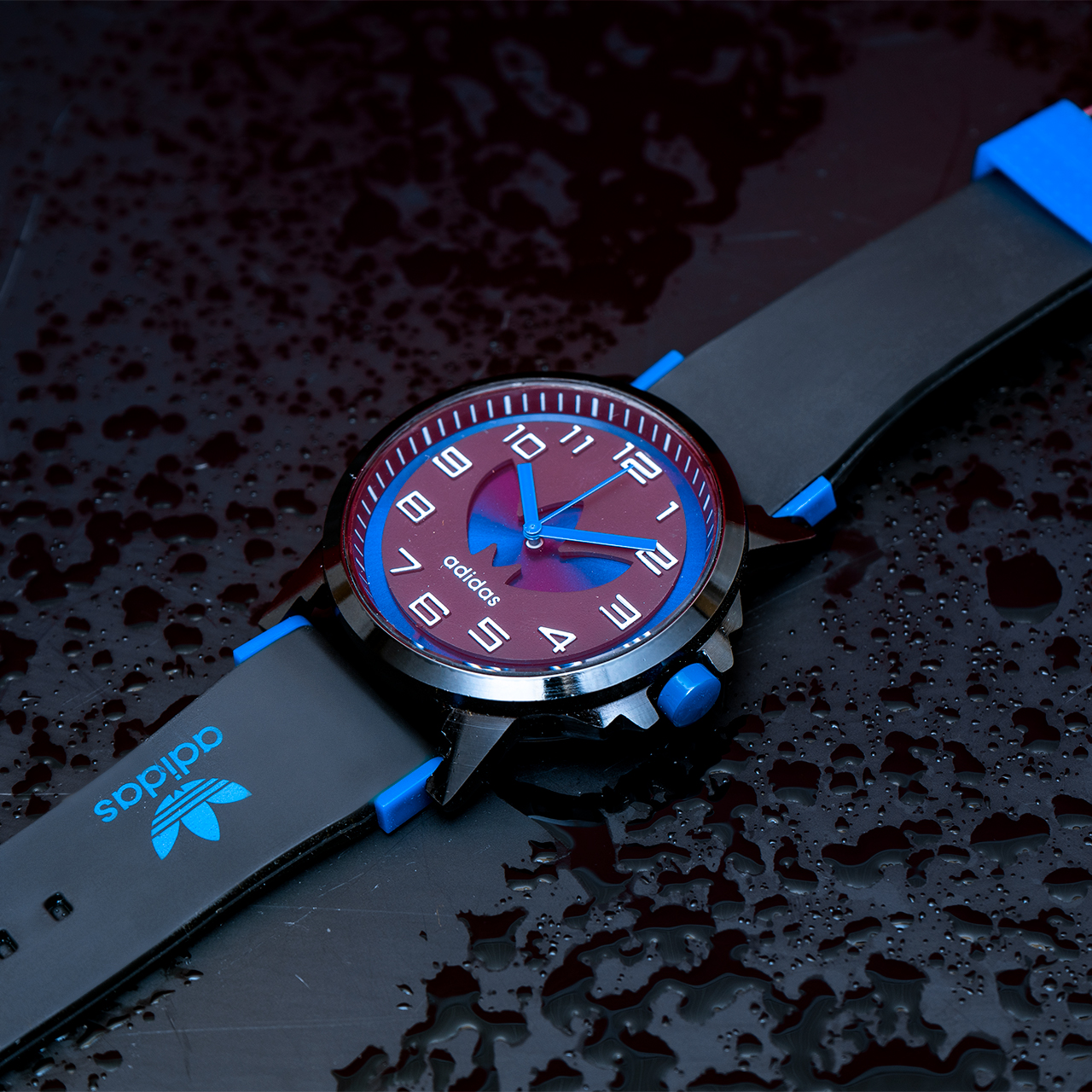 ساعت مچی آدیداس مشکی آبی مدل E51