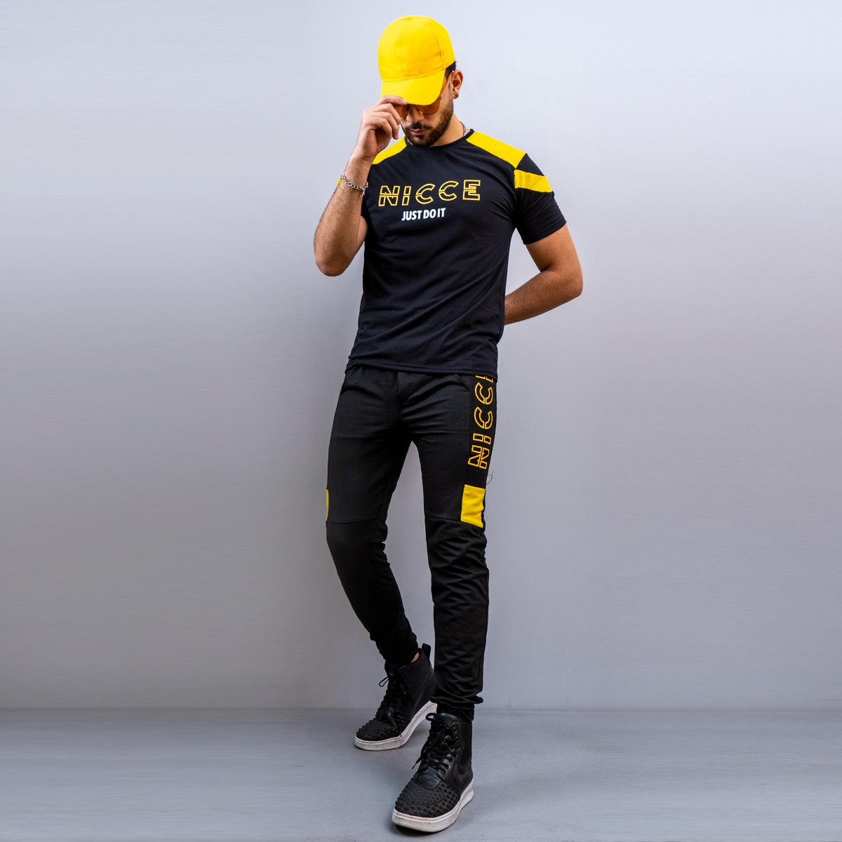 ست تیشرت و شلوار مردانه NICCE زرد مشکی
