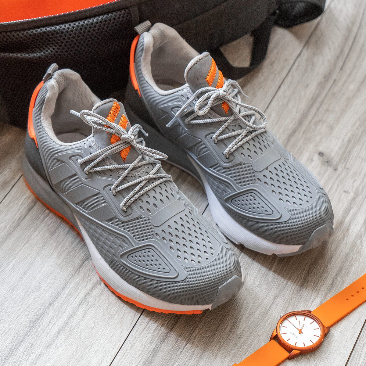 کفش ورزشی Adidas نارنجی طوسی مردانه مدل Ipala