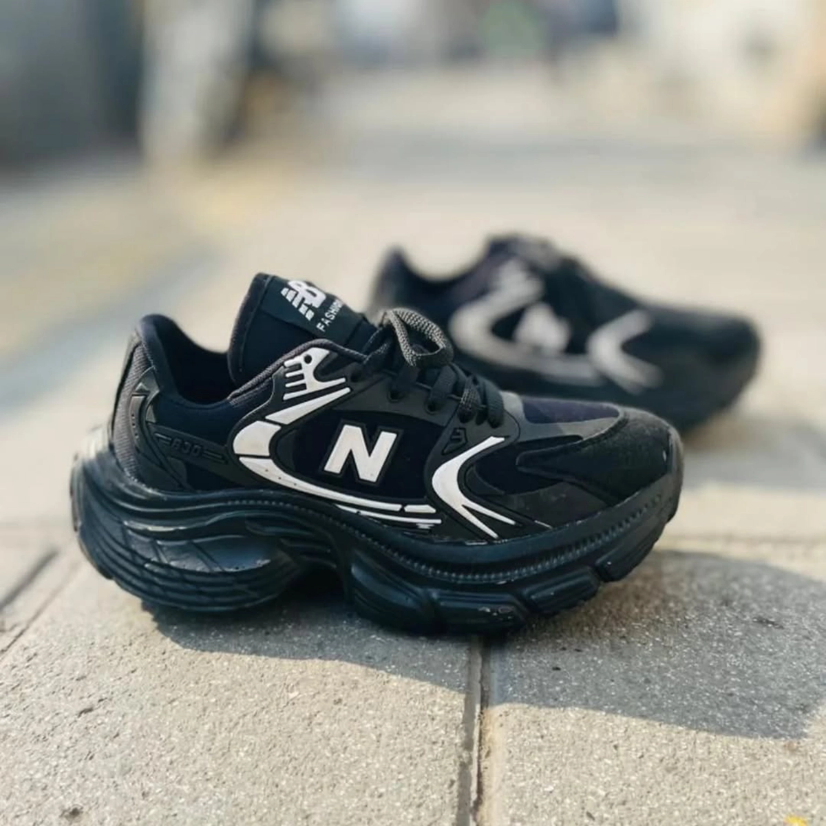 کفش ورزشی زنانه نیوبالانس لژدار مشکی مدل Mahla